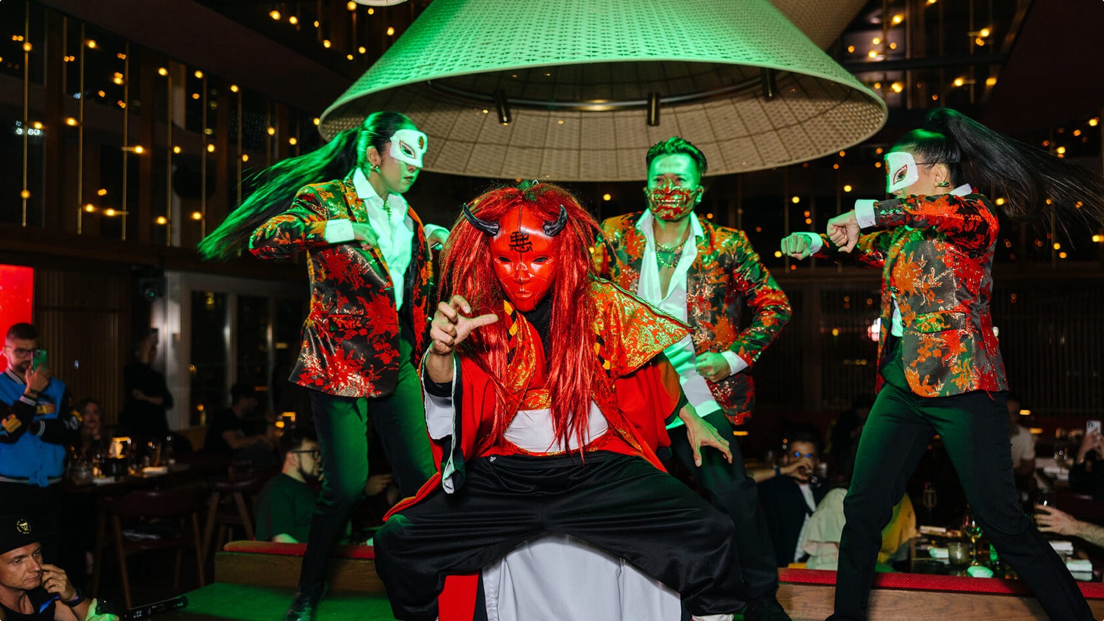 Performers in costume at an ANS show